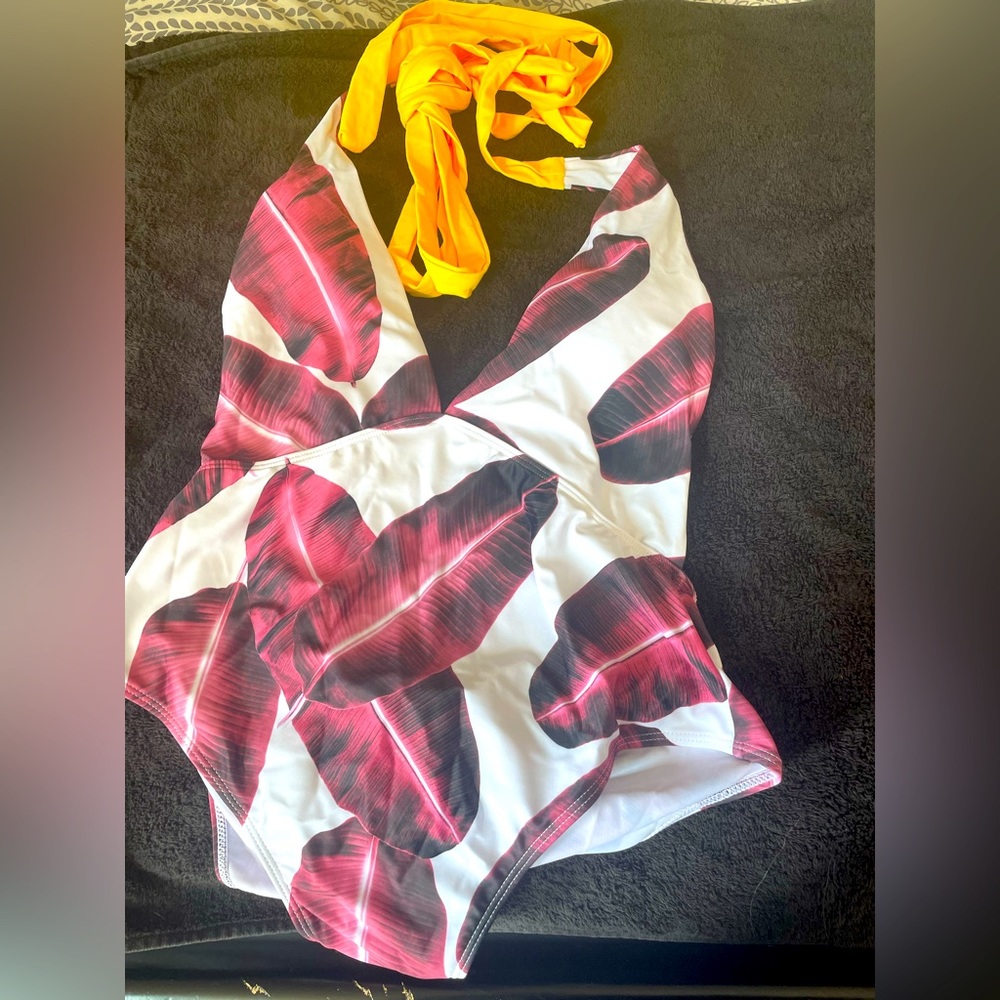 New. Size large sexy floral one piece